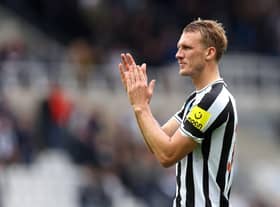 Dan Burn of Newcastle United applauds the fans following the Premier League match between Newcastle United and AFC Bournemouth at St. James Park on September 17, 2022 in Newcastle upon Tyne, England. (Photo by George Wood/Getty Images)