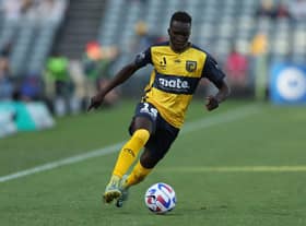 Garang Kuol of the Mariners with the ball during the round one A-League Men's match between Central Coast Mariners and Newcastle Jets at Central Coast Stadium, on December 21, 2022, in Gosford, Australia. (Photo by Scott Gardiner/Getty Images)