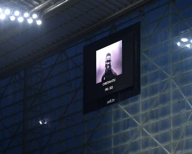 The LED board shows an image of former Premier League player Christian Atsu. (Photo by Stu Forster/Getty Images).