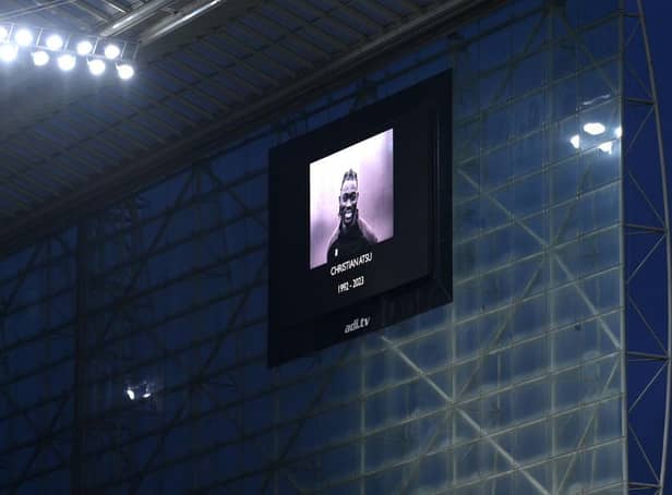 The LED board shows an image of former Premier League player Christian Atsu. (Photo by Stu Forster/Getty Images).