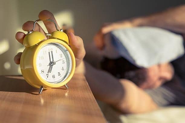 Of the 70% of Brits who confess to hitting the snooze button, the average person snoozes their alarm for 20 minutes each morning