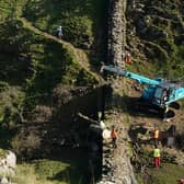 Work begins in the removal of the felled Sycamore Gap tree, on Hadrian's Wall in Northumberland