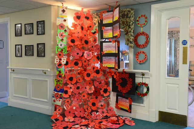 Hebburn Lakes Primary School donation of 100 poppies to Bedewell Grange Care Home.