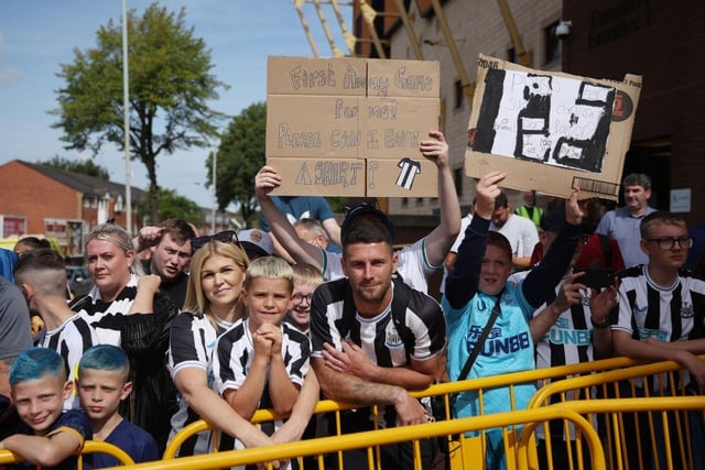 Fans outside Molineux queue for a glimpse of the Newcastle United team as they arrive