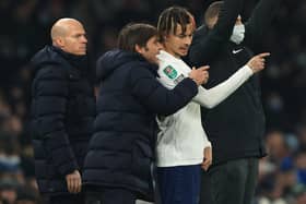 Antonio Conte manager of Tottenham Hotspur speaks with Dele Alli. (Photo by Marc Atkins/Getty Images)