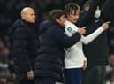 Antonio Conte manager of Tottenham Hotspur speaks with Dele Alli. (Photo by Marc Atkins/Getty Images)