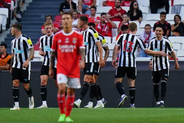 Newcastle United players celebrate one of Miguel Almiron's first-half goals.