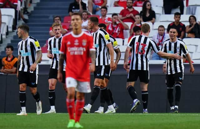 Newcastle United players celebrate one of Miguel Almiron's first-half goals.