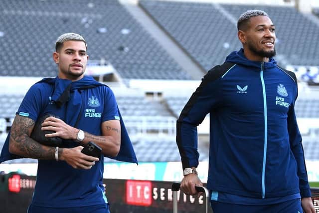 Newcastle players Bruno Guimaraes (l) and Joelinton arrive at St James' Park (Photo by Stu Forster/Getty Images)