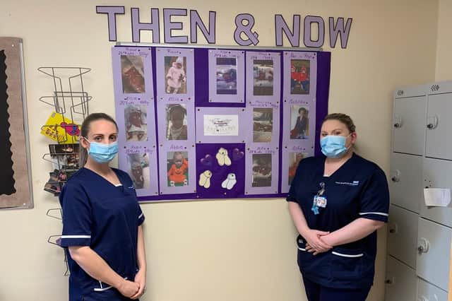 Nurses Emily Cameron and Abigail Owen with the display