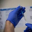 Latest figures show that more than 50 million doses of coronavirus vaccine have now been given in England. (Photo by CRISTINA QUICLER/AFP via Getty Images)