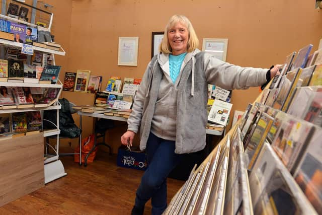 Lilian Griffiths at her Jackie White's Market charity stall.