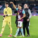 CJ Egan-Riley points to man of the match James Trafford after his two penatly saves against Sunderland. Photo: Kelvin Lister-Stuttard