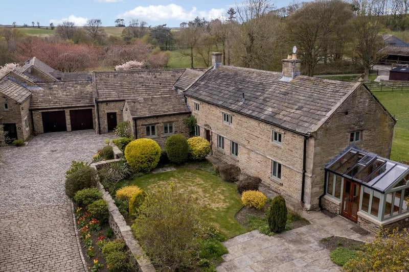 Offfers of more than £1.3 million are invited for this six-bedroom, detached farmhouse conversion, complete with separate two-bedroom holiday cottage and equestrian facilities. It is on the market with Redbrik Estate Agents.