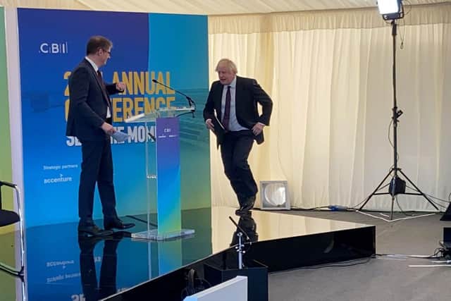 Boris Johnson is welcomed to the stage at the 2021 CBI annual conference in South Shields.