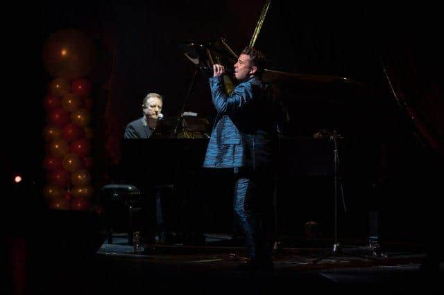 John Miles (left) performing with Joe McElderry at the South Shields Custom House in 2019