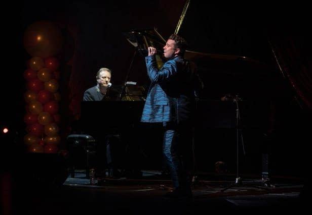 John Miles (left) performing with Joe McElderry at the South Shields Custom House in 2019