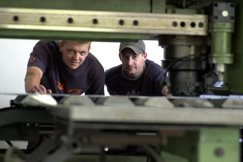 AE Engineering apprentice James Lepianka and skilled operator Matthew Reynolds in 2002