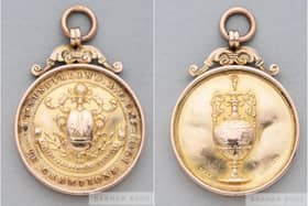 Both sides of Jimmy Watson's 1901-02 championship medal. Image from Graham Budd.