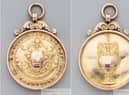 Both sides of Jimmy Watson's 1901-02 championship medal. Image from Graham Budd.