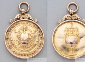 Both sides of Jimmy Watson's 1901-02 championship medal. Image from Graham Budd.