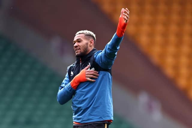Joelinton acknowledges Newcastle United fans at Carrow Road.