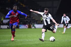 Callum Roberts of Notts County shoots. (Photo by Nathan Stirk).