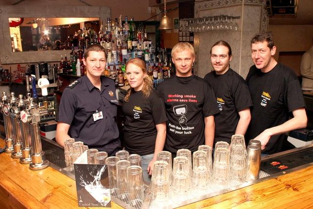 Steve Helps, station Manager at Chesterfield, Gemma Jones, Matt James, Andrew Meakin, Chandlers Bar Staff, and Roger Butler, Bar owner/secretary Pub Watch in 2006