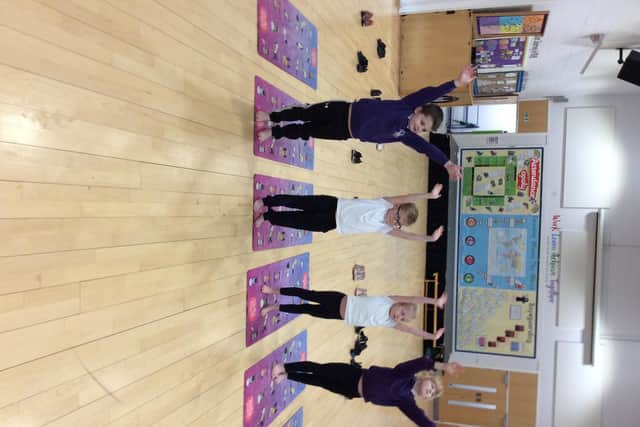 Pupils at Hebburn Lakes Primary doing their yoga class.