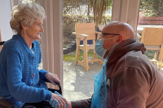 Palmersdene care home resident Mary Pinder was able to see her son John Pinder and hold his hand for the first time as restictions were eased.
