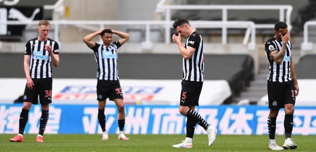 Fabian Schar of Newcastle United reacts after being shown a red card during the Premier League match between Newcastle United and Arsenal at St. James Park on May 02, 2021 in Newcastle upon Tyne, England.