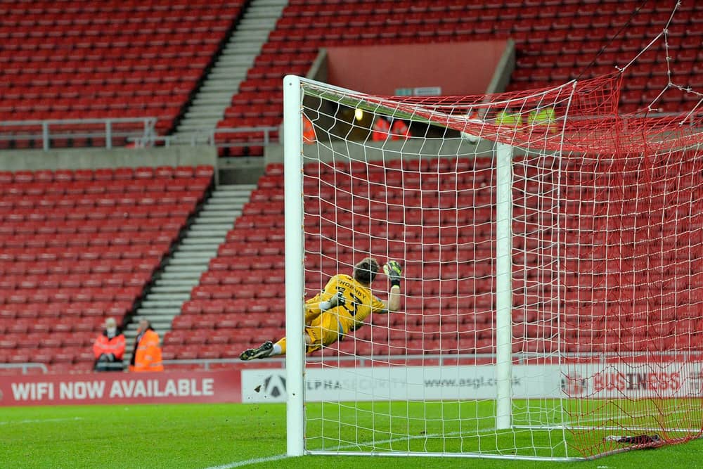 Alex Pritchard hits the bar with a late free kick