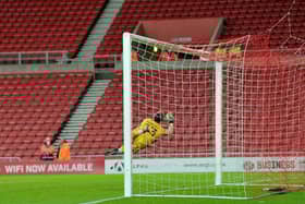 Alex Pritchard hits the bar with a late free kick