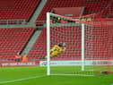 Alex Pritchard hits the bar with a late free kick