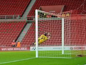 Alex Pritchard hits the bar with a late free kick