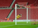 Alex Pritchard hits the bar with a late free kick