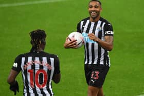 Callum Wilson of Newcastle United celebrates with teammate Allan Saint-Maximin (Photo by Stu Forster/Getty Images)