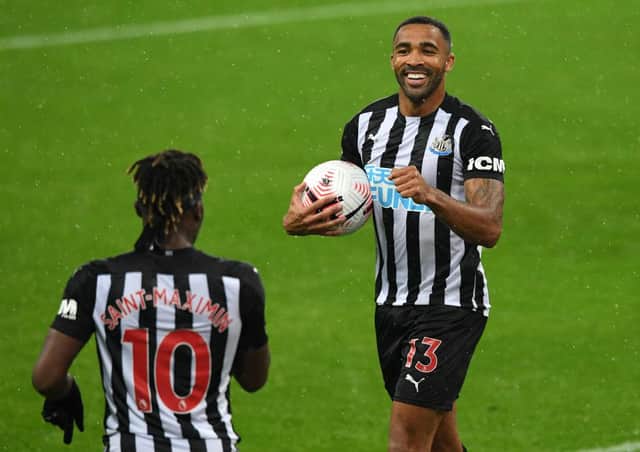 Callum Wilson of Newcastle United celebrates with teammate Allan Saint-Maximin (Photo by Stu Forster/Getty Images)