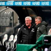 Newcastle United's English head coach Steve Bruce (L) and Manchester United's Norwegian manager Ole Gunnar Solskjaer speak before the English Premier League football match between Newcastle United and Manchester United at St James' Park in Newcastle-upon-Tyne, north east England on October 17, 2020.