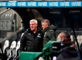 Newcastle United's English head coach Steve Bruce (L) and Manchester United's Norwegian manager Ole Gunnar Solskjaer speak before the English Premier League football match between Newcastle United and Manchester United at St James' Park in Newcastle-upon-Tyne, north east England on October 17, 2020.