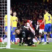 Eddie Nketiah of Arsenal scores their team's fourth goal and his hat-trick past Lee Burge of Sunderland. (Photo by Ryan Pierse/Getty Images)
