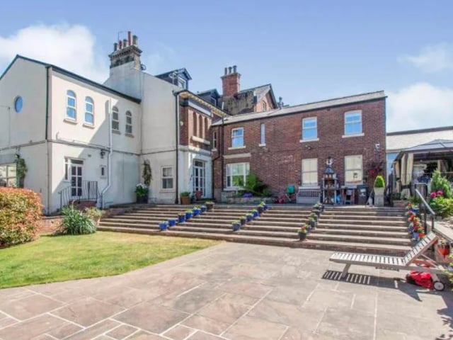 A newly-built six bedroom house; it's valued at £900,000.