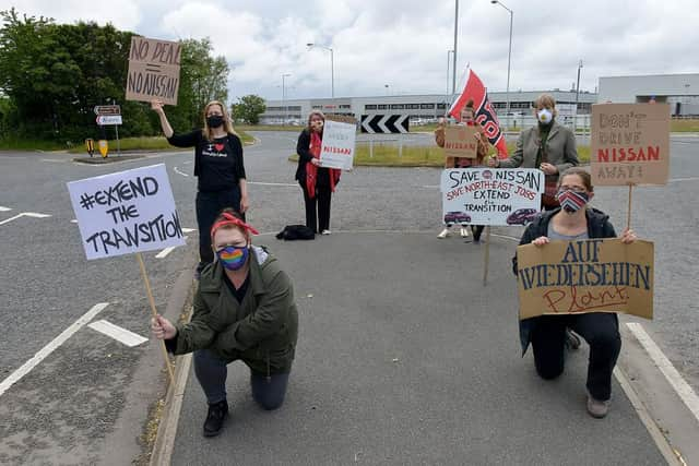 Campaigners pictured outside Nissan during an earlier demonstration.