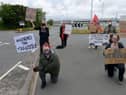 Campaigners pictured outside Nissan during an earlier demonstration.