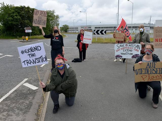 Campaigners pictured outside Nissan during an earlier demonstration.