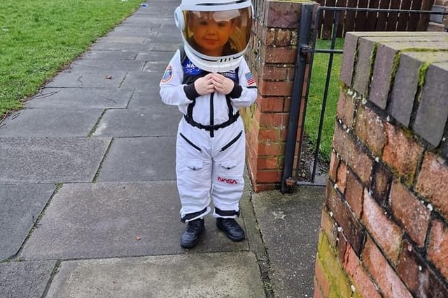 Carter, 3 dressed as an astronaut.