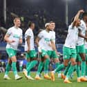 Jacob Murphy of Newcastle United celebrates with teammate Alexander Isak after scoring the team's fourth goal during the Premier League match between Everton FC and Newcastle United at Goodison Park on April 27, 2023 in Liverpool, England. (Photo by Alex Livesey/Getty Images)