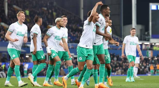 Jacob Murphy of Newcastle United celebrates with teammate Alexander Isak after scoring the team's fourth goal during the Premier League match between Everton FC and Newcastle United at Goodison Park on April 27, 2023 in Liverpool, England. (Photo by Alex Livesey/Getty Images)