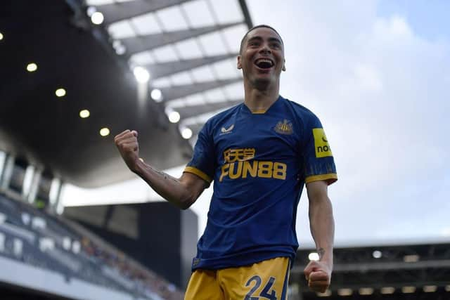 Miguel Almiron of Newcastle United celebrates after scoring their sides fourth goal during the Premier League match between Fulham FC and Newcastle United at Craven Cottage on October 01, 2022 in London, England. (Photo by Tom Dulat/Getty Images)