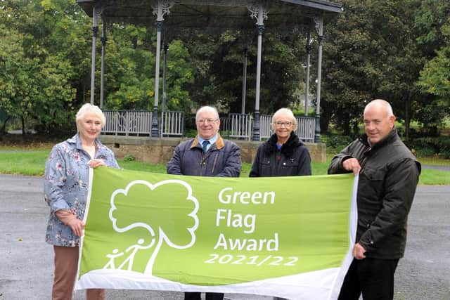 South Tyneside Council Cllr Ernest Gibson with Friends of West Park, South Shields, Chairman Gladys Hobson, Secretary Doug Mather, and Cllr Ann Hetherington, with the parks Green Flag Award.